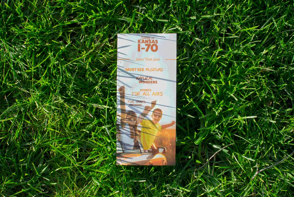 A travel brochure shown in multiple outdoor settings one after the other.