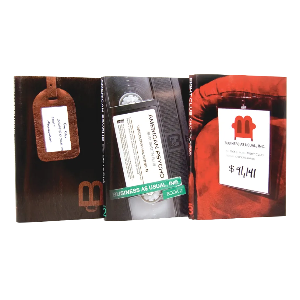 Three books standing upright showing the front covers.