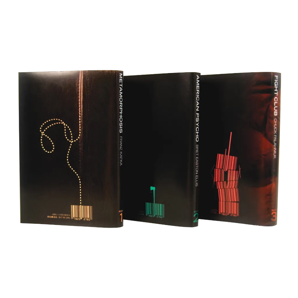 Three books standing upright showing the back covers.